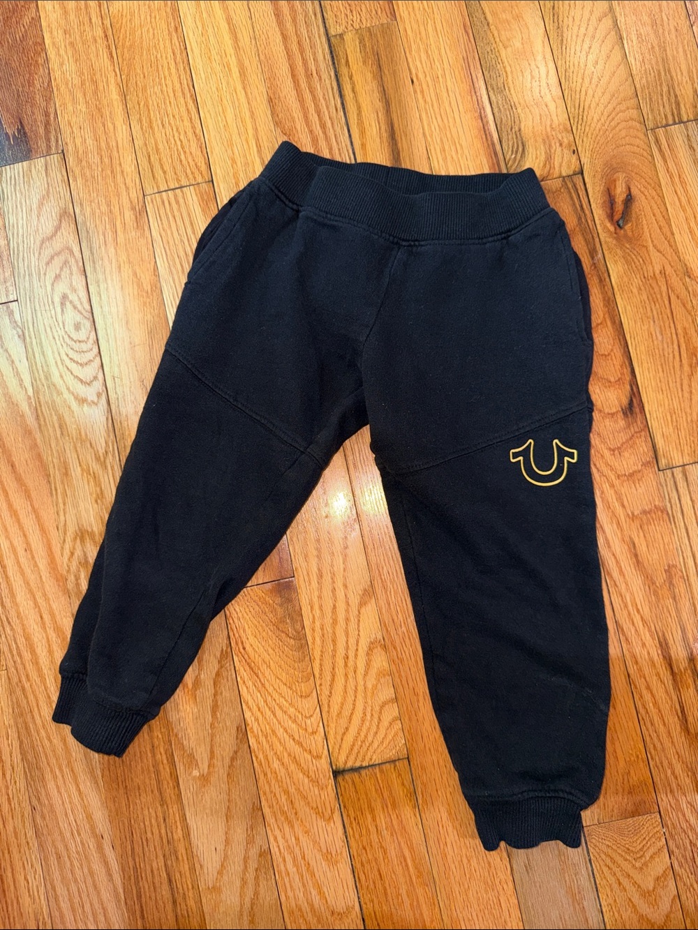 True Religion Kids Black Sweat Joggers with Yellow Horseshoe Emblem